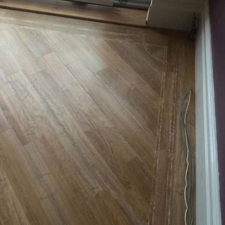 Amtico fitted with Art Deco border and corners